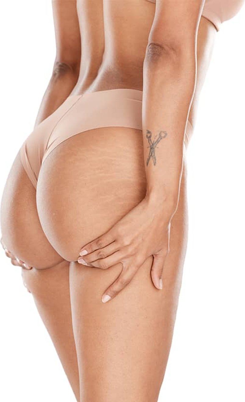 Artist preparing tools for a fine-line tattoo